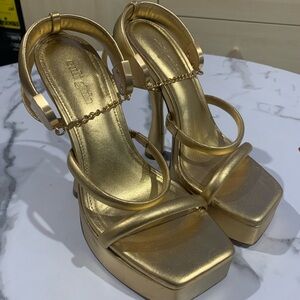 Cult Gaia 
Gold Elodie Platform Sandals